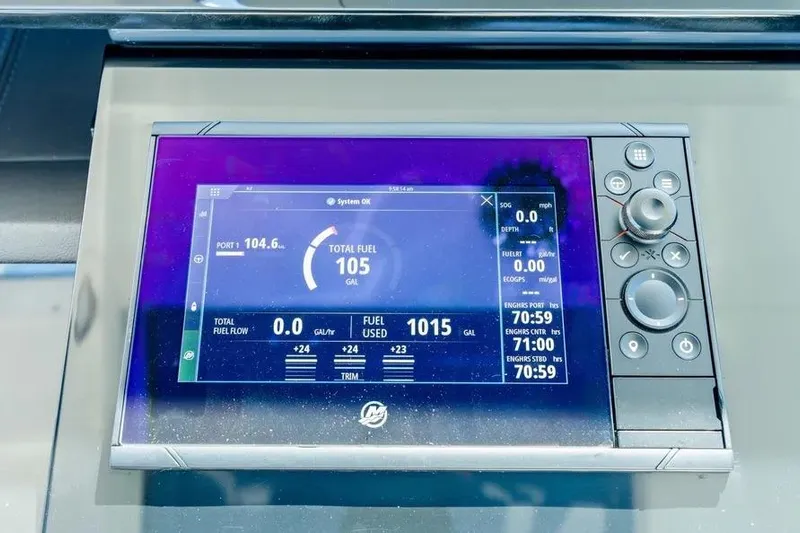  Yacht Photos Pics Dashboard display of 2024 Formula 380 Super Sport Crossover OB showing fuel and engine data.