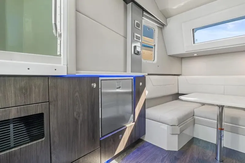  Yacht Photos Pics 2024 Formula 380 Super Sport Crossover OB interior with modern seating and sleek cabinetry.