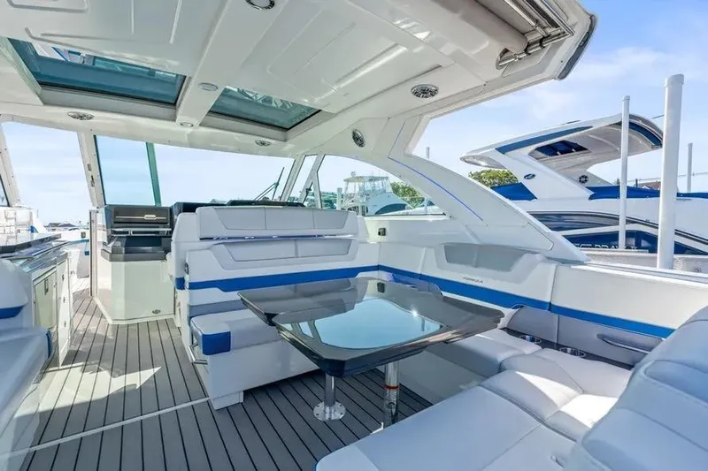  Yacht Photos Pics 2024 Formula 380 Super Sport Crossover OB interior with sleek seating and modern design.