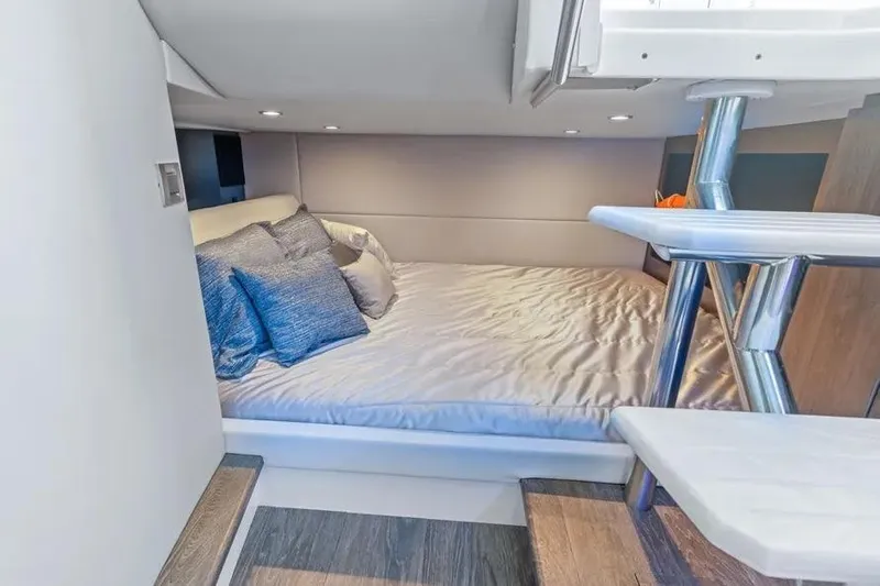  Yacht Photos Pics 2024 Formula 380 Super Sport Crossover OB cabin with cozy bed and modern design.