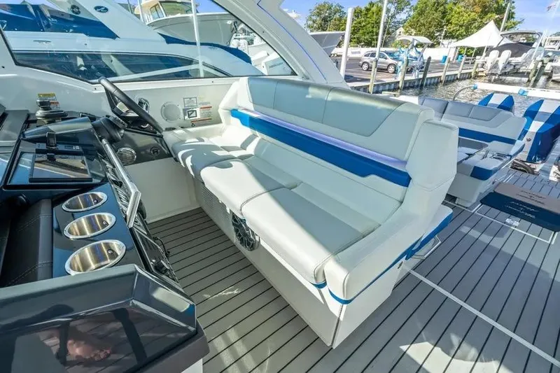  Yacht Photos Pics 2024 Formula 380 Super Sport Crossover OB interior with sleek seating and modern dashboard.