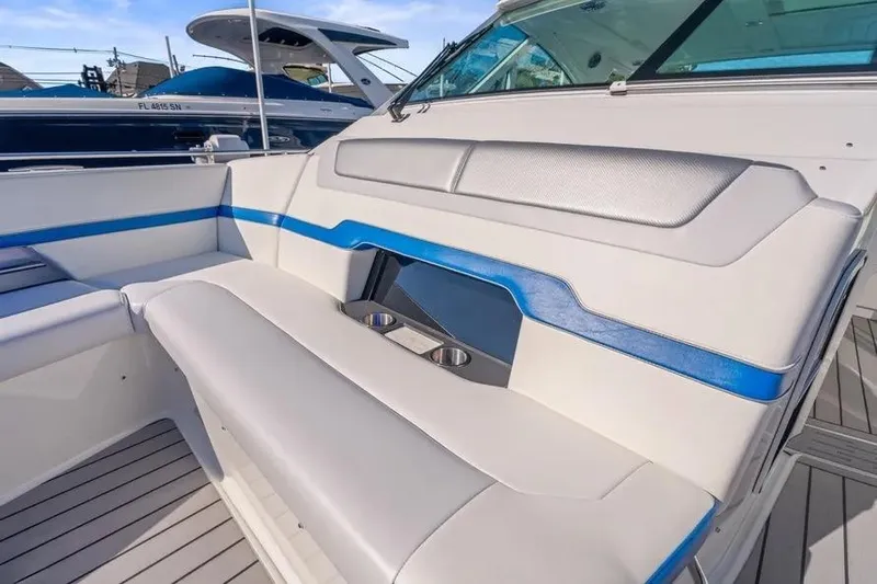  Yacht Photos Pics 2024 Formula 380 Super Sport Crossover OB interior with sleek seating and cup holders.