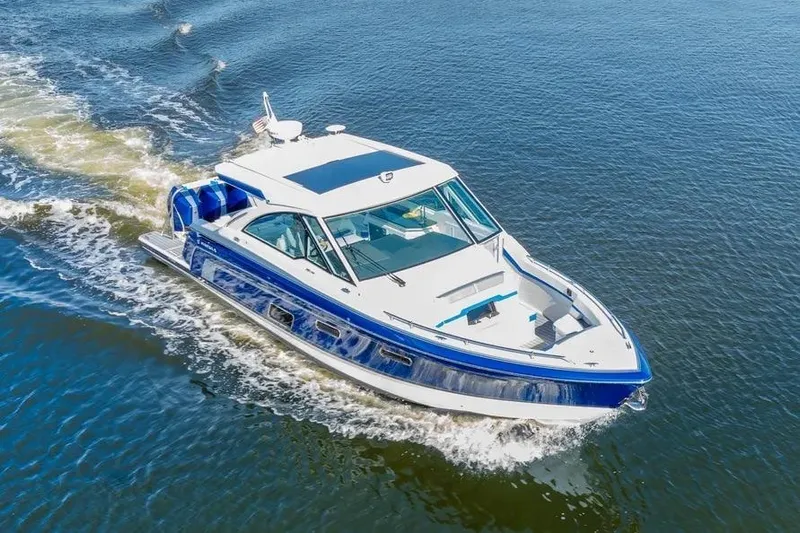  Yacht Photos Pics 2024 Formula 380 Super Sport Crossover OB cruising on open water.