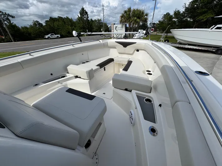  Yacht Photos Pics 2023 Sailfish 312 CC boat interior with spacious seating and modern design.