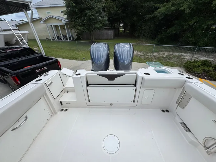 Yacht Photos Pics 2023 Sailfish 312 CC boat deck with dual outboard motors.
