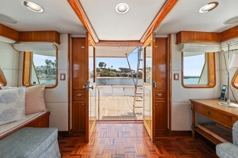 Amakua Yacht Photos Pics Interior of 1970 Hargrave Yachtfisher with wooden accents and ocean view.