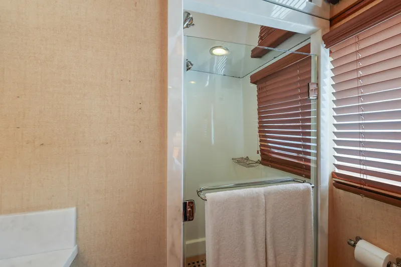 Amakua Yacht Photos Pics Bathroom interior of 1970 Hargrave Yachtfisher with shower and towel rack.