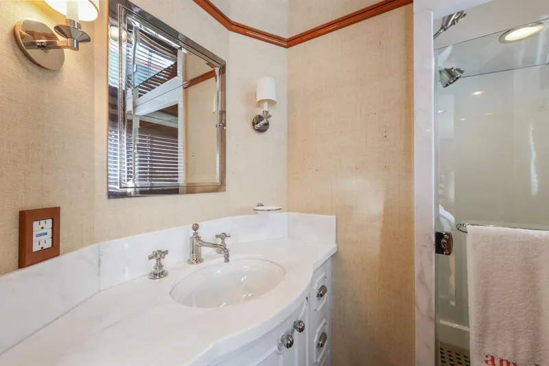 Amakua Yacht Photos Pics Luxurious bathroom on 1970 Hargrave Yachtfisher, featuring elegant fixtures and a modern shower.