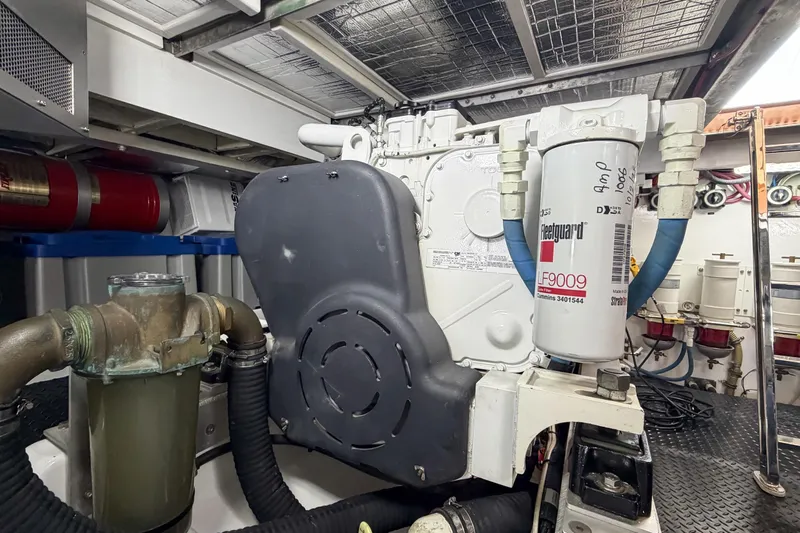 Amakua Yacht Photos Pics Engine room of a 1970 Hargrave Yachtfisher, featuring mechanical components and filters.