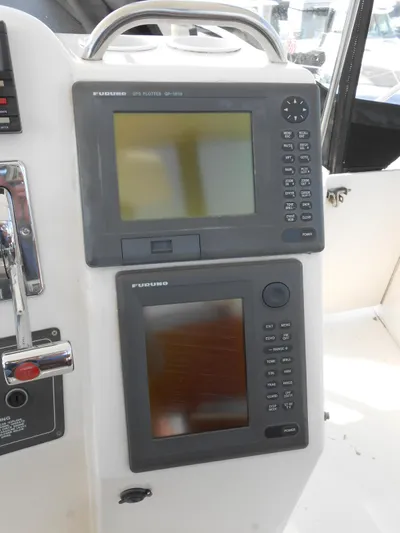 Fifty-150 Yacht Photos Pics 1999 Silverton 352 MY boat dashboard with dual Furuno navigation displays.