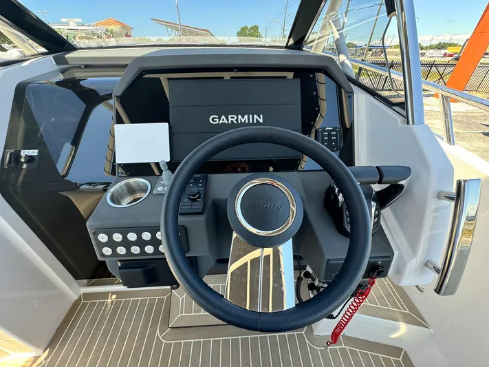  Yacht Photos Pics 2024 Windy SR28 CC boat helm with Garmin navigation system.