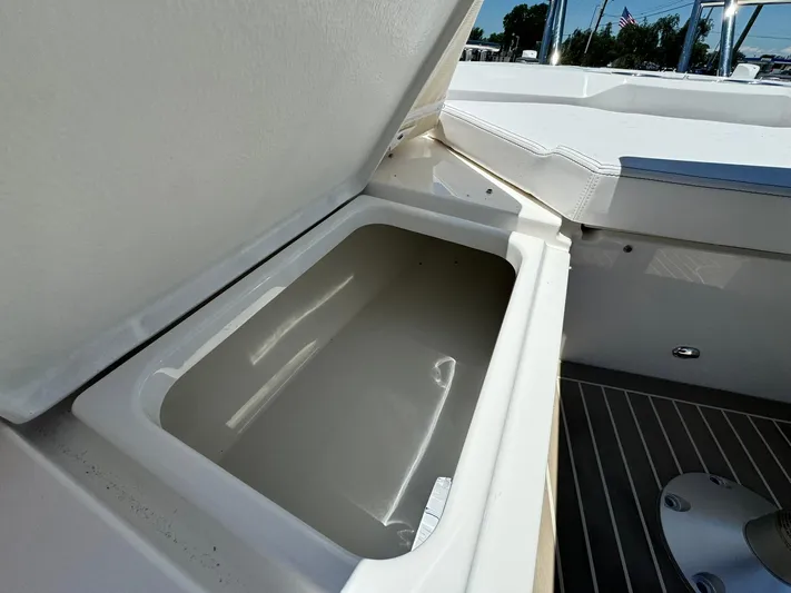  Yacht Photos Pics Open storage compartment on 2024 Windy SR28 CC boat.