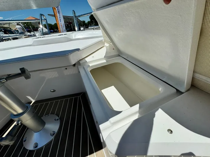  Yacht Photos Pics 2024 Windy SR28 CC boat storage compartment with open lid.