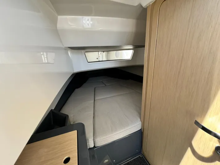  Yacht Photos Pics Interior cabin of 2024 Windy SR28 CC boat with cozy sleeping area.