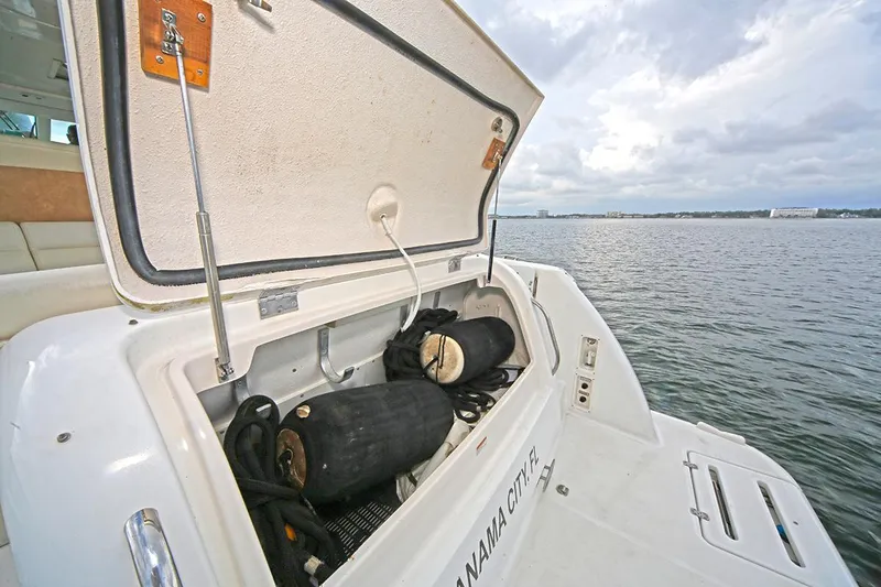 Ciao Bella Yacht Photos Pics 2007 Tiara Yachts 3900 Sovran storage compartment open by the water.