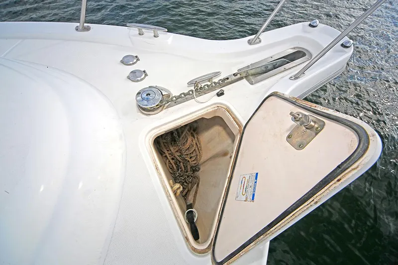 Ciao Bella Yacht Photos Pics 2007 Tiara Yachts 3900 Sovran anchor locker with open hatch, showing ropes and anchor chain.
