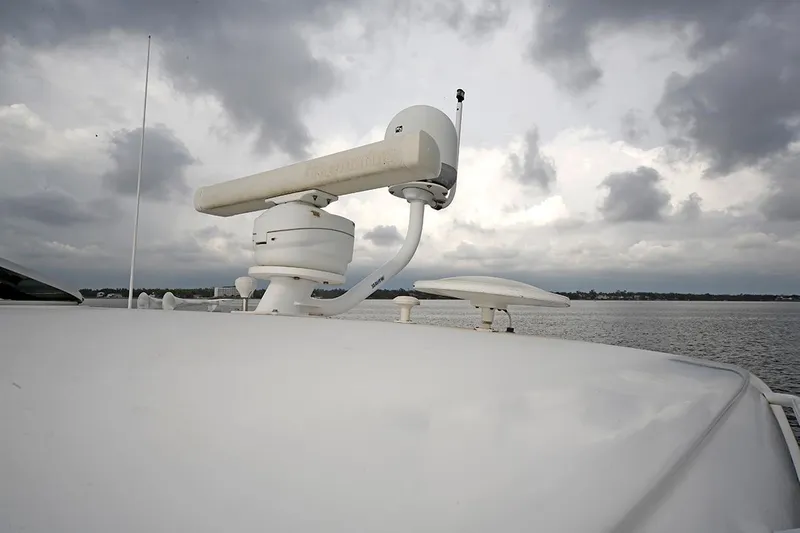 Ciao Bella Yacht Photos Pics Radar equipment on 2007 Tiara Yachts 3900 Sovran against cloudy sky.