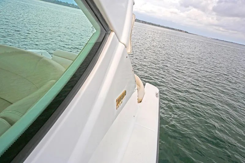 Ciao Bella Yacht Photos Pics 2007 Tiara Yachts 3900 Sovran on calm waters, showcasing sleek design and luxury interior.