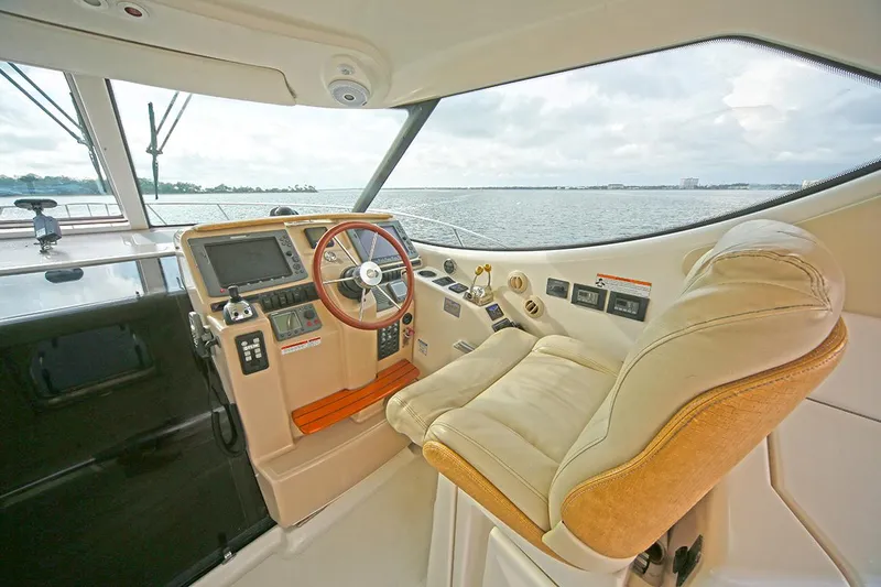 Ciao Bella Yacht Photos Pics 2007 Tiara Yachts 3900 Sovran helm with leather seat and ocean view.