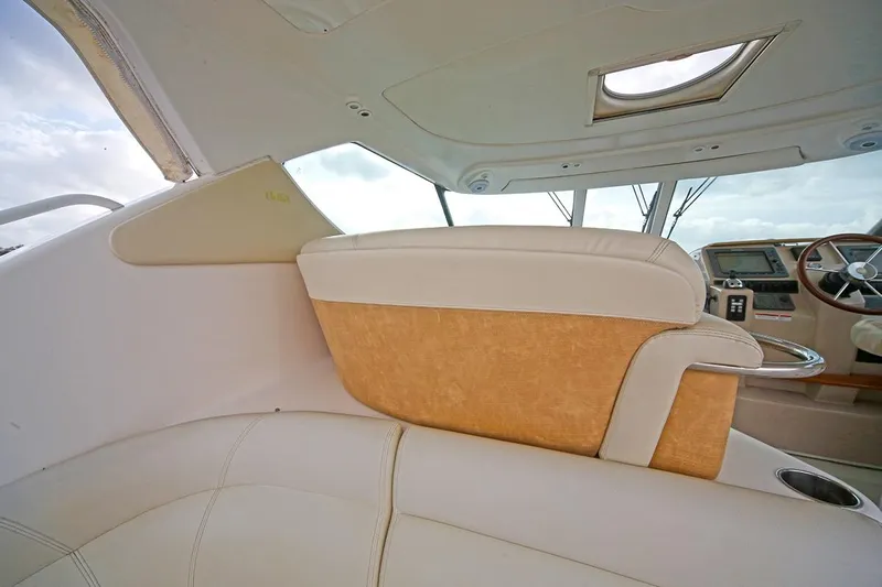 Ciao Bella Yacht Photos Pics Interior of 2007 Tiara Yachts 3900 Sovran, featuring luxurious seating and helm area.