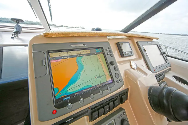Ciao Bella Yacht Photos Pics 2007 Tiara Yachts 3900 Sovran helm with navigation display and controls.