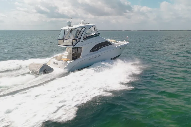 Aimee Yacht Photos Pics 2008 Sea Ray 520 Sedan Bridge yacht cruising on open water.