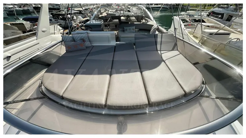  Yacht Photos Pics Luxurious 2014 Absolute 52 FLY yacht with spacious sunbathing deck in marina.