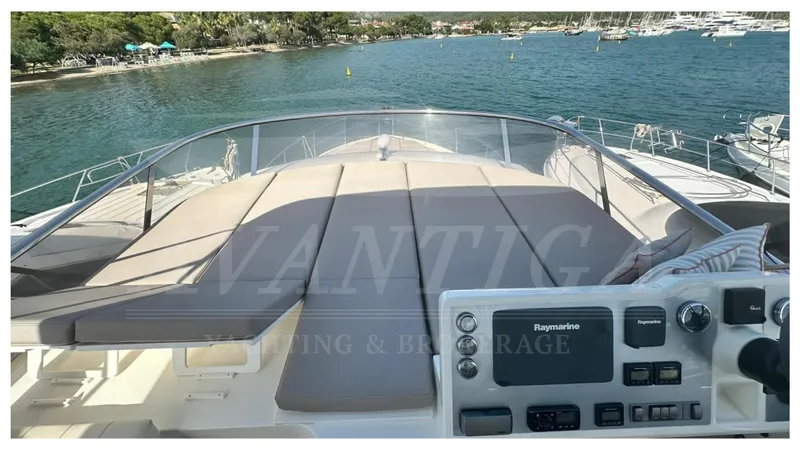  Yacht Photos Pics Luxurious 2014 Absolute 52 FLY yacht with spacious deck overlooking serene waters.