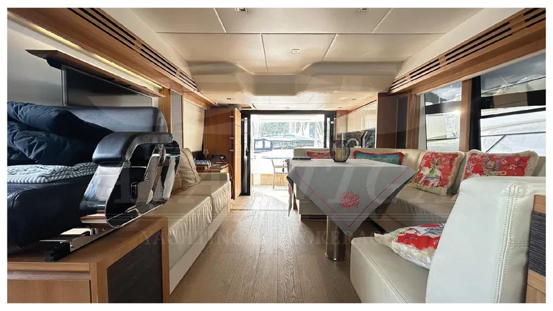  Yacht Photos Pics Luxurious interior of 2014 Absolute 52 FLY yacht with elegant seating and decor.