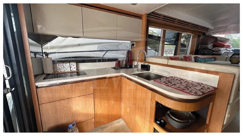  Yacht Photos Pics Luxurious kitchen interior of 2014 Absolute 52 FLY yacht with modern amenities.