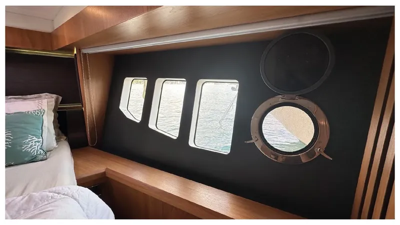  Yacht Photos Pics Interior cabin view of 2014 Absolute 52 FLY yacht with porthole and windows.