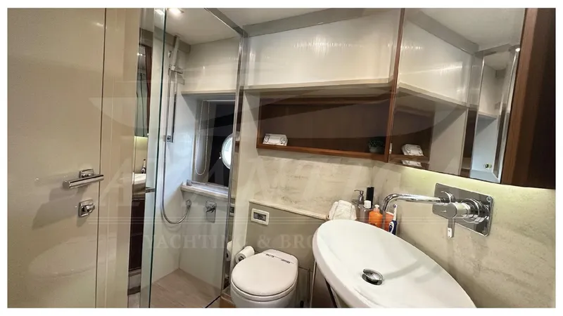  Yacht Photos Pics Luxurious bathroom in 2014 Absolute 52 FLY yacht with modern fixtures and elegant design.