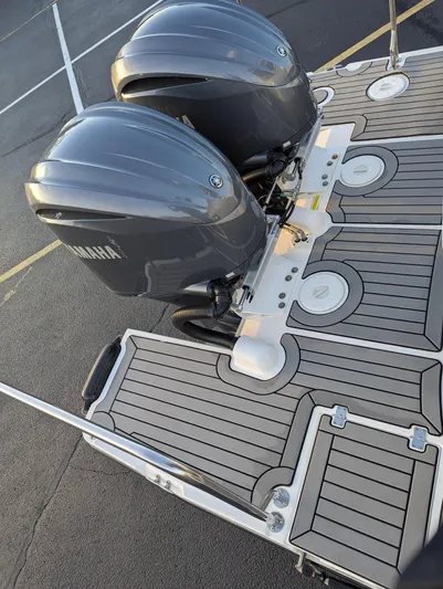  Yacht Photos Pics 2022 Cutwater C-32 CB boat with dual Yamaha outboard engines on deck.