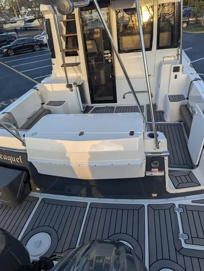  Yacht Photos Pics 2022 Cutwater C-32 CB boat deck with seating and storage.