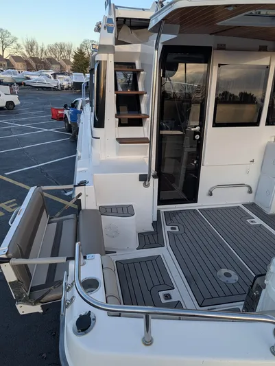  Yacht Photos Pics 2022 Cutwater C-32 CB boat with spacious deck and modern design.