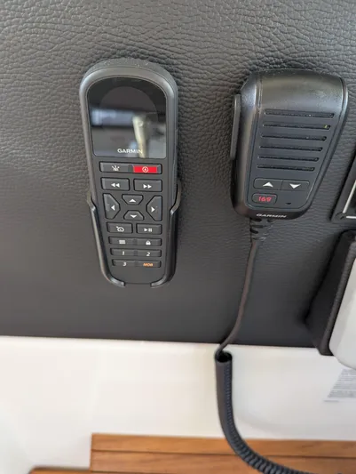  Yacht Photos Pics Garmin marine radio controls on 2022 Cutwater C-32 CB boat dashboard.