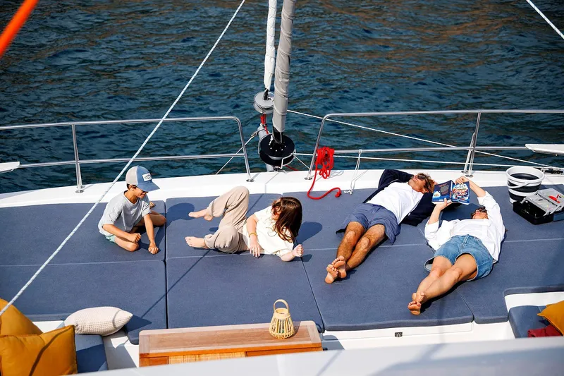 Voila Yacht Photos Pics Family relaxing on a 2026 Bali 5.2 yacht, enjoying the sun and sea.