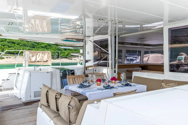 Cascadia 2 Yacht Photos Pics Luxurious Lagoon 560 yacht interior with elegant dining setup, 2012 model.