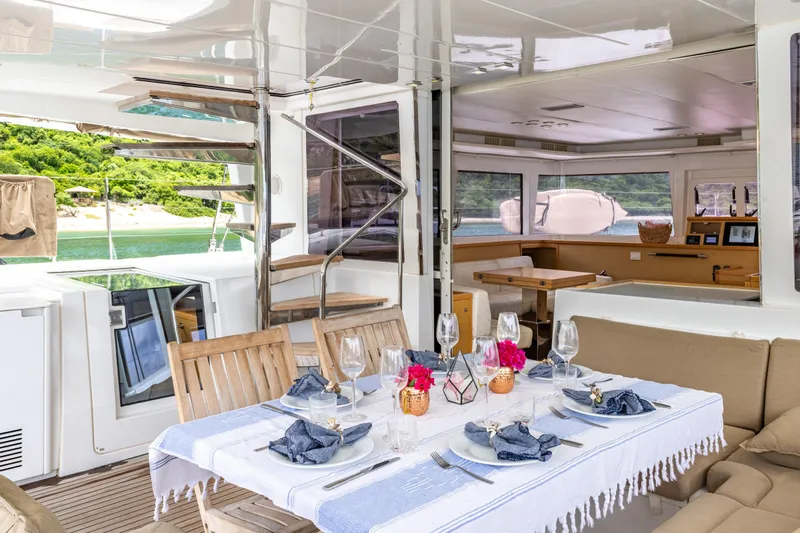 Cascadia 2 Yacht Photos Pics Luxurious Lagoon 560 yacht interior, elegantly set dining area, 2012 model.