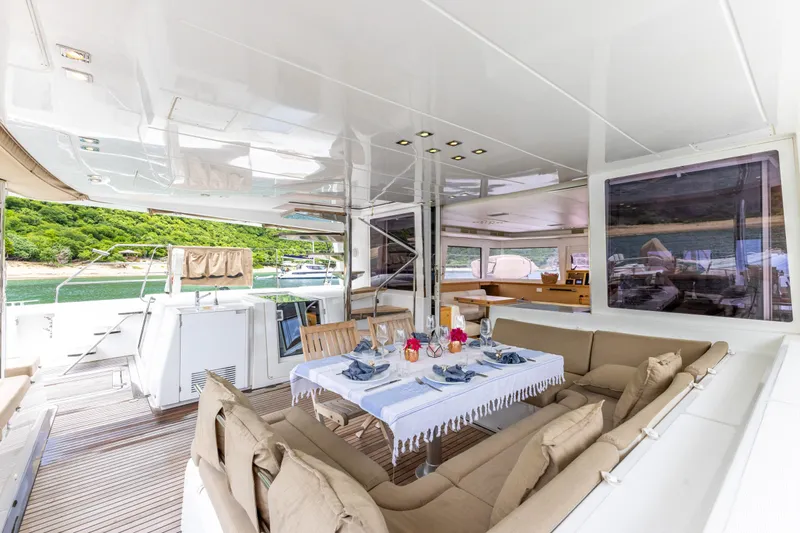 Cascadia 2 Yacht Photos Pics Luxurious Lagoon 560 yacht interior with elegant dining setup, 2012 model.