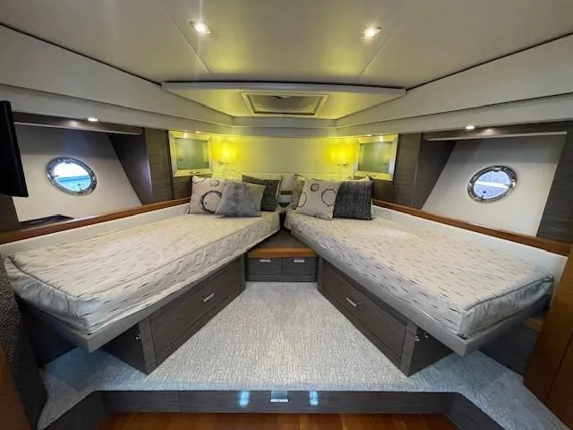 Nexlevel Yacht Photos Pics 2019 Tiara Yachts C53 Coupe interior cabin with twin beds and modern lighting.