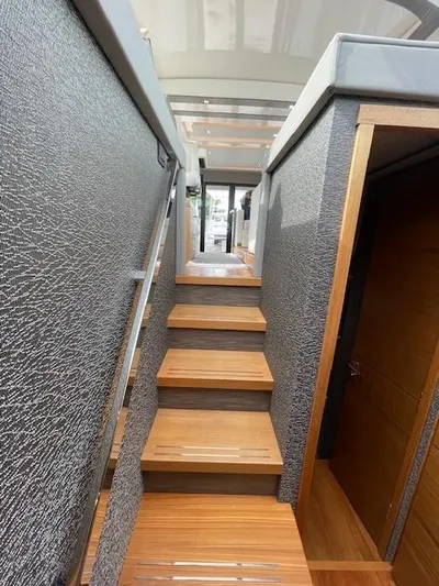 Nexlevel Yacht Photos Pics Staircase inside 2019 Tiara Yachts C53 Coupe, modern yacht interior design.
