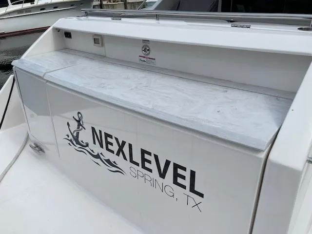 Nexlevel Yacht Photos Pics 2019 Tiara Yachts C53 Coupe with NexLevel Spring, TX branding on the stern.