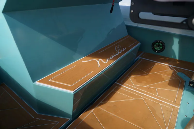  Yacht Photos Pics Novielli Veloche 349 boat interior, 2025 model, featuring elegant wood and teal design.
