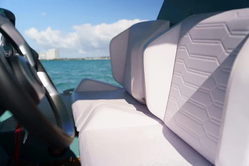  Yacht Photos Pics Interior of 2025 Novielli Veloche 349 boat with white cushioned seating.