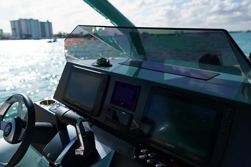  Yacht Photos Pics Helm of 2025 Novielli Veloche 349 yacht with modern navigation displays.