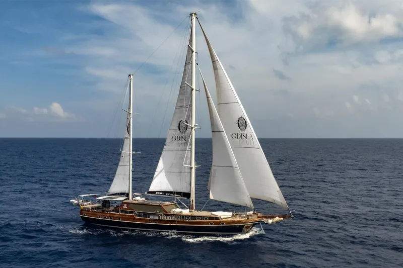 Odisea Yacht Photos Pics Custom Mahogany Gulet sailing on open sea, 2006 Expedition model.