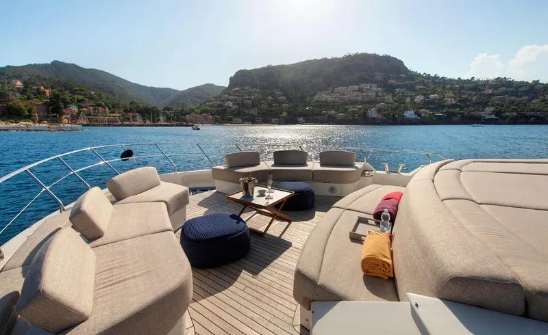 Esmeralda Of The Seas Yacht Photos Pics Luxurious 2018 Monte Carlo Yachts MCY 96 deck with scenic coastal view.