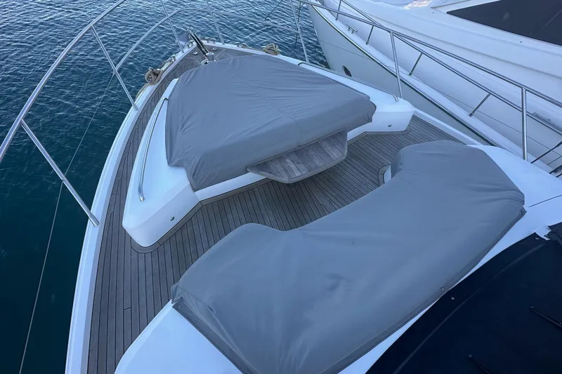  Yacht Photos Pics Luxury 2020 Princess S62 yacht deck with covered seating area.
