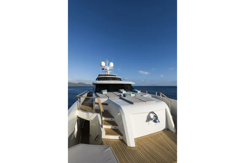 Serenity Yacht Photos Pics Luxurious 2015 Mondomarine SF40 yacht deck with clear blue sky and ocean view.